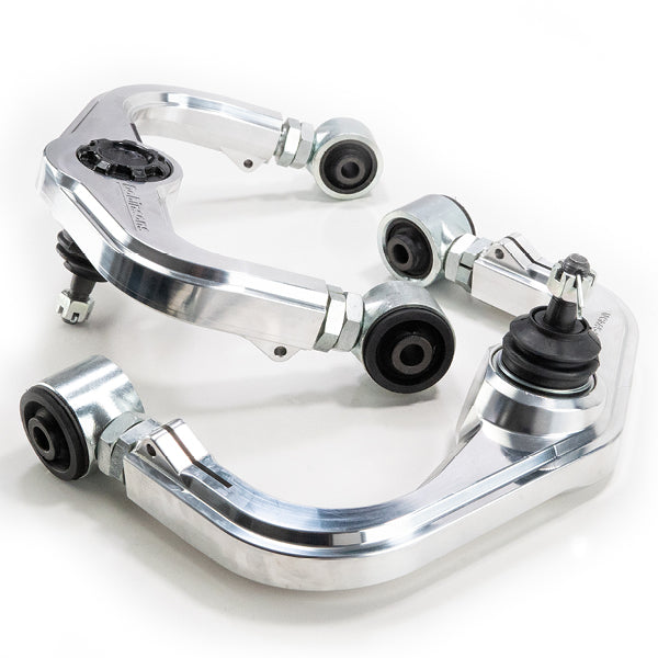 Par de brazos superiores Dobinsons ajustables para Navara D40/NP300 — UCA45-205K - Imagen 3
